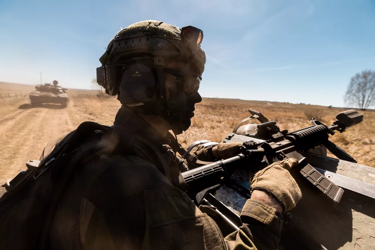 A soldier with the Swedish Army’s South Skåne Regiment looks out of a CV90 Infantry Fighting Vehicle near Revingehed, Sweden during Exercise Aurora 26. Past iterations of Aurora, Sweden’s largest military exercise series, focused on mobilising the country’s armed forces for national defence. This year’s iteration also set out to test Sweden’s ability to incorporate Allied forces in those plans. More than 18,000 soldiers from 13 countries participated.