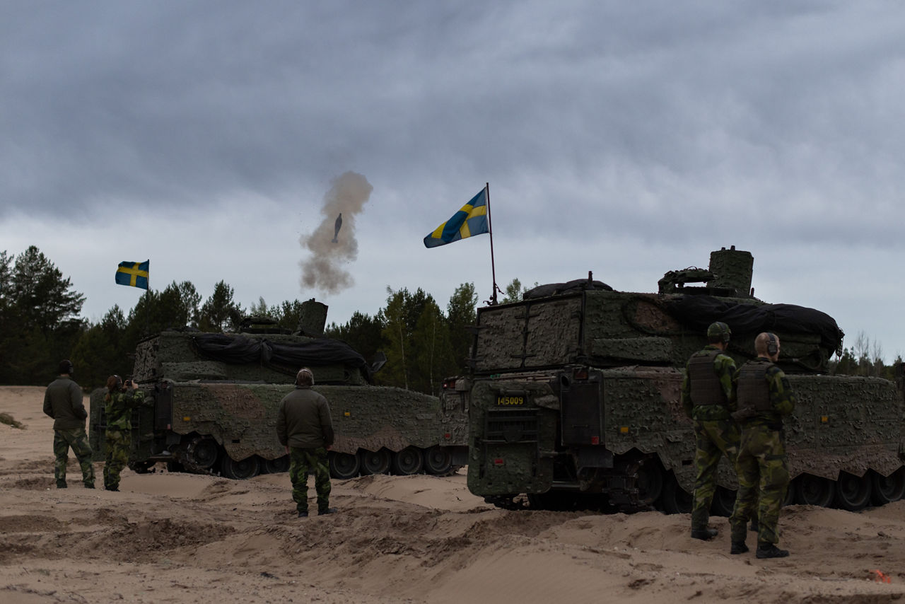 A Swedish Army CV90 Infantry Fighting Vehicle equipped with 120mm mortars conducts a live fire exercise at Camp Ādaži in Latvia during exercise Aurora 26. Past iterations of Aurora, Swedish-led military exercise series, focused on mobilising the country’s armed forces for national defence, this year’s iteration also set out to test Sweden’s ability to incorporate Allied forces in those plans. Part of the exercise saw an armoured battalion from the South Skåne Regiment deploy to Latvia for training, while using the same transportation and logistics methods that might be used to reinforce NATO Allies in times of crisis. More than 18,000 soldiers from 13 countries participated.