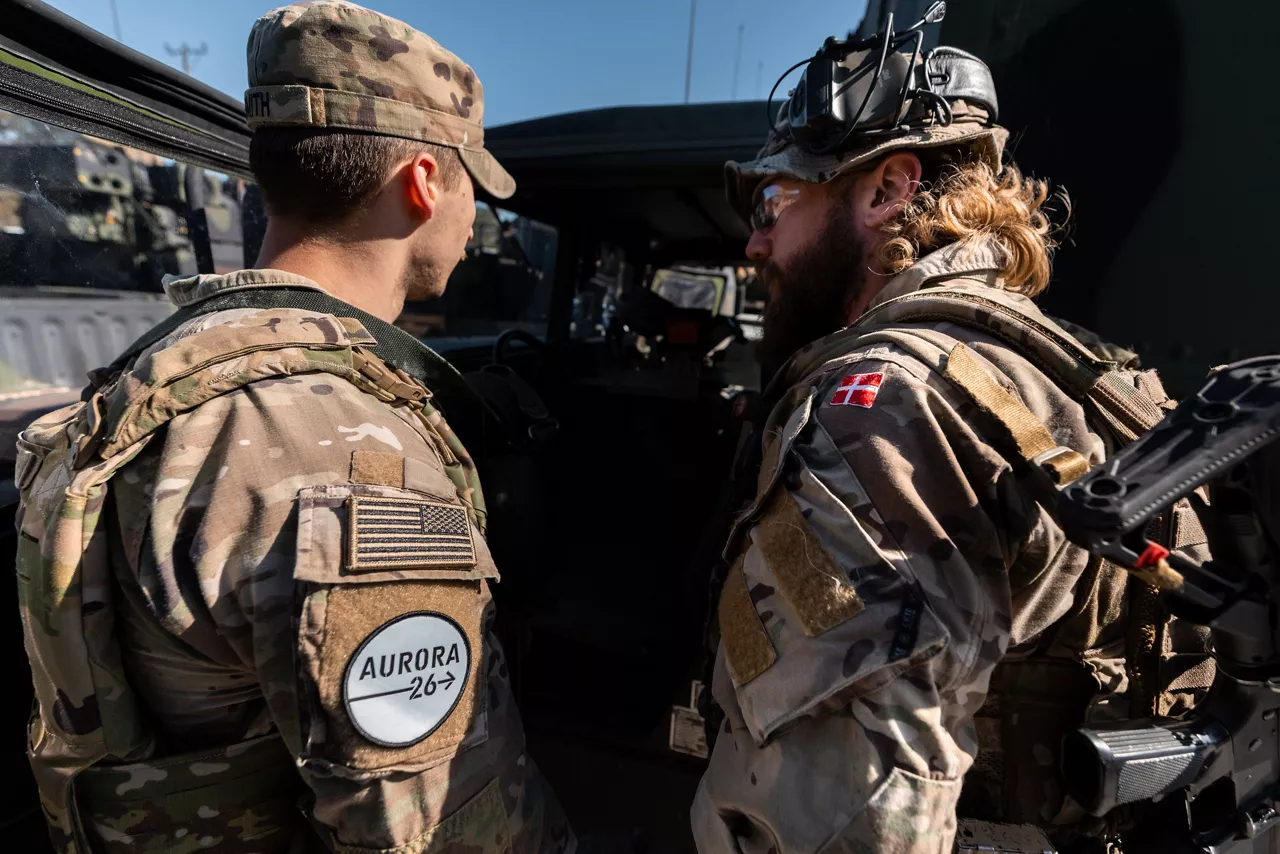 Danish Home Guard soldiers confer with US Army air defence soldiers prior to moving out for a training mission on Gotland Island in Sweden during Exercise Aurora 26. Past iterations of Aurora, Swedish-led military exercise series, focused on mobilising the country’s armed forces for national defence, this year’s iteration also set out to test Sweden’s ability to incorporate Allied forces in those plans. More than 18,000 soldiers from 13 countries participated.