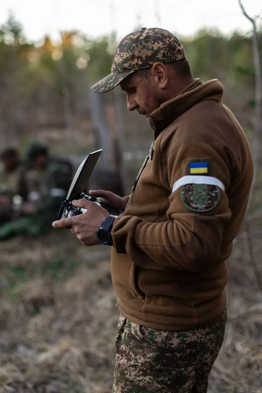 A drone operator from the Ukrainian Army’s National Guard flies a reconnaissance drone on Gotland Island in Sweden during Exercise Aurora 26. The Armed Forces of Ukraine sent drone operators to Sweden for Aurora 26 to pass on lessons learned to their NATO counterparts, while providing a challenging opposing force for Allied soldiers. Past iterations of Aurora, Swedish-led military exercise series, focused on mobilising the country’s armed forces for national defence, this year’s iteration also set out to test Sweden’s ability to incorporate Allied forces in those plans. More than 18,000 soldiers from 13 countries participated.