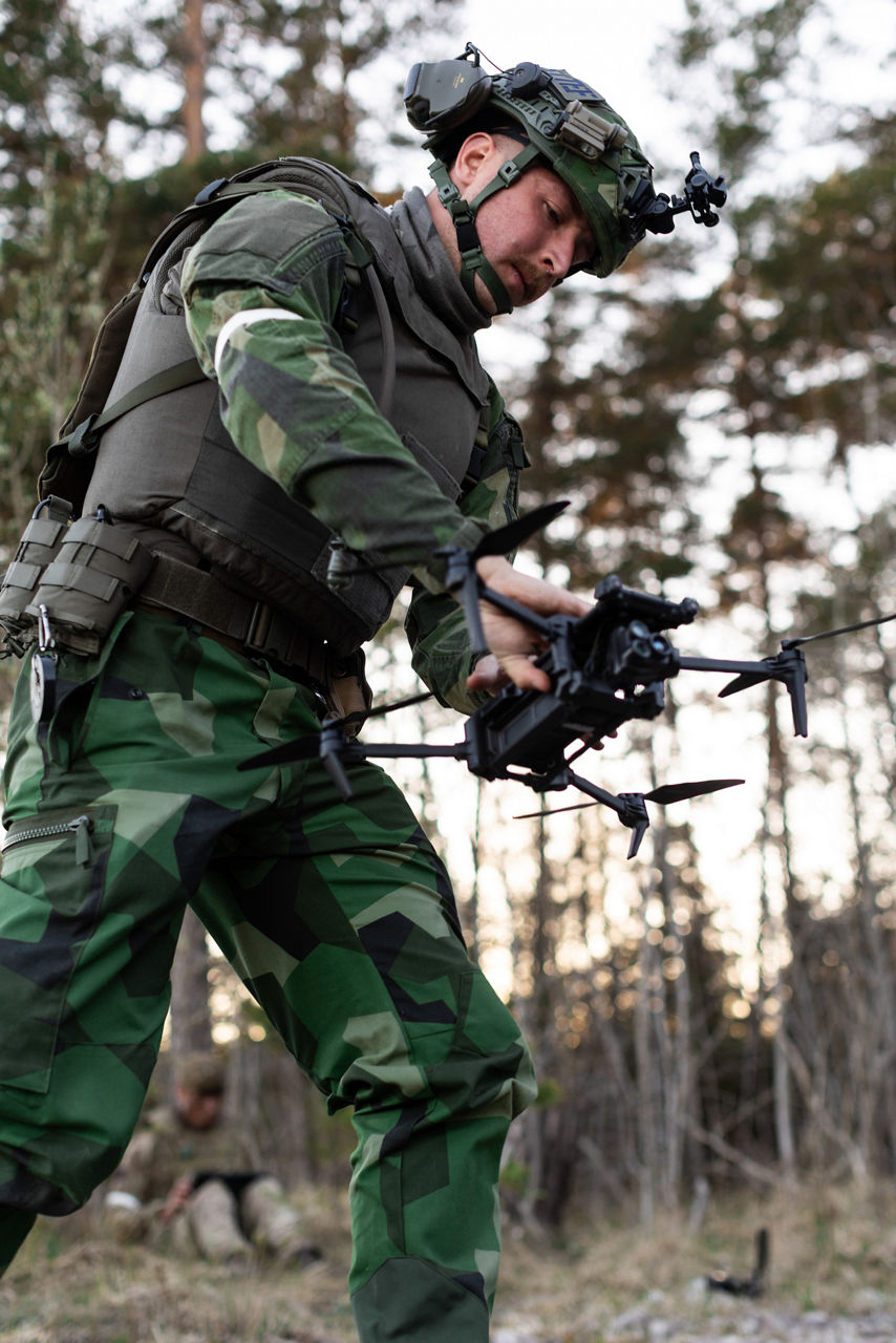 A Swedish Army drone operator retrieves a quadcopter reconnaissance drone on Gotland Island in Sweden during Exercise Aurora 26. The Armed Forces of Ukraine sent drone operators to Sweden for Aurora 26 to pass on lessons learned to their NATO counterparts, while providing a challenging opposing force for Allied soldiers. Past iterations of Aurora, Swedish-led military exercise series, focused on mobilising the country’s armed forces for national defence, this year’s iteration also set out to test Sweden’s ability to incorporate Allied forces in those plans. More than 18,000 soldiers from 13 countries participated.