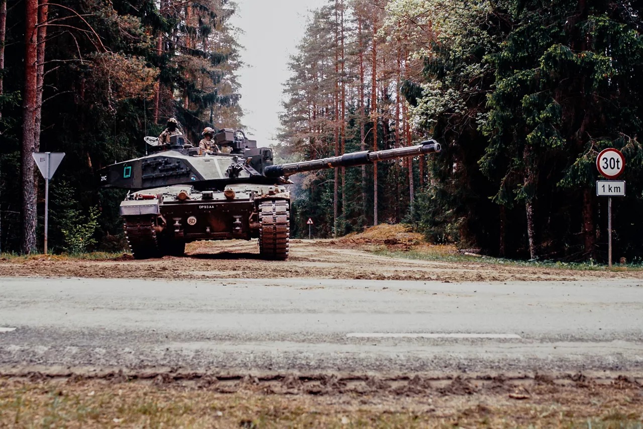 A British Army Challenger 2 Main Battle Tank guards an intersection in southern Estonia during Exercise Spring Storm 26. Spring Storm is the largest annual exercise of the Estonian Defence Forces, testing the leadership and combat readiness of the Estonian Army, Air Force, Navy and Cyber Command, as well as the Estonian Defence League. Forces from NATO's multinational battlegroup in Estonia also participated, ensuring that, should Estonia need to defend its territory, its troops will be ready to seamlessly integrate Allied combat power. Spring Storm 26 took place throughout Estonia and in northern Latvia from 4 May to 1 June 2026.