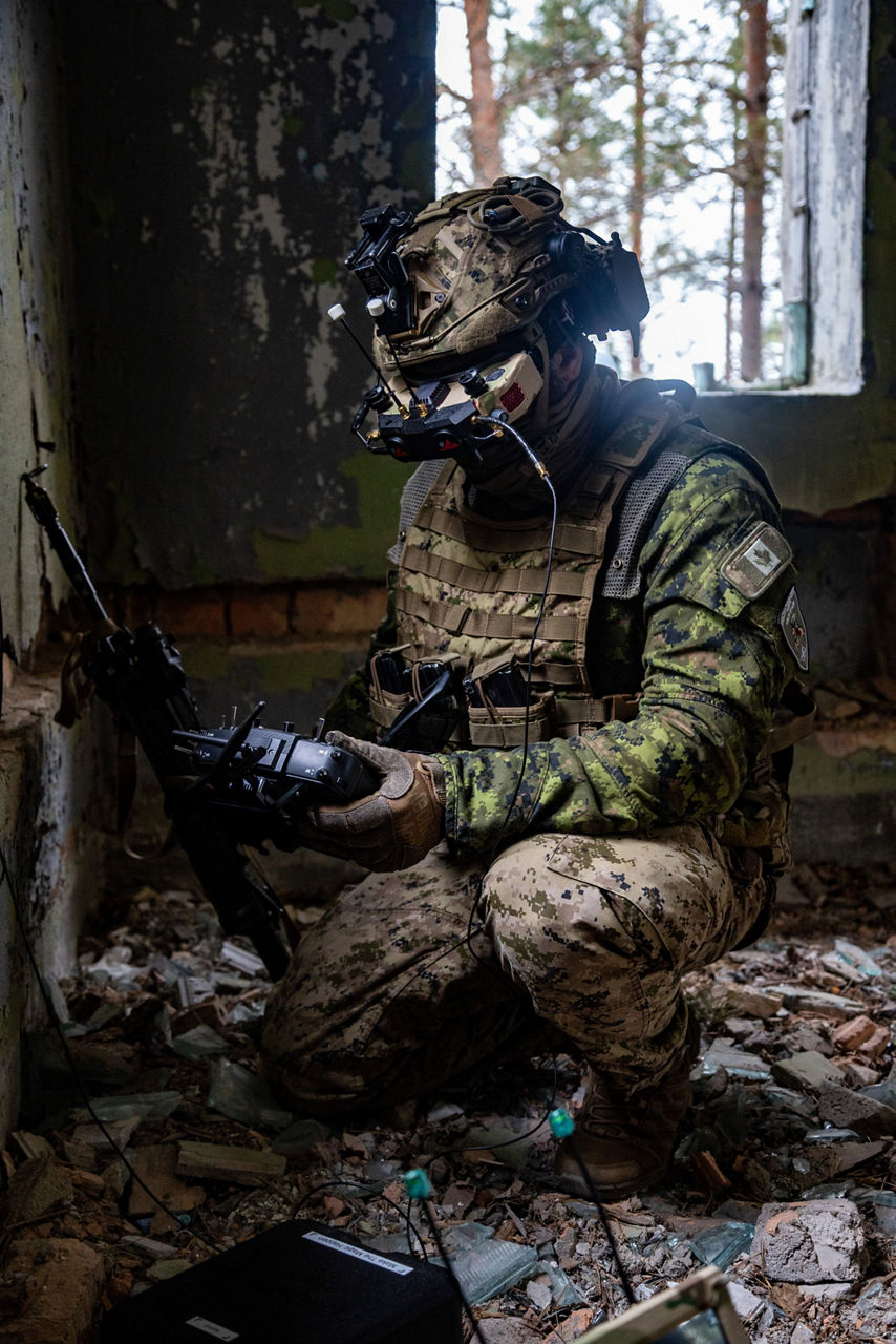 A Canadian Armed Forces drone pilot operating an FPV drone during a training exercise in Latvia. NATO’s Multinational Brigade in Latvia regularly runs training exercises where troops integrate drones of all kinds, making sure Allied forces keep pace with innovations in modern wafare.
