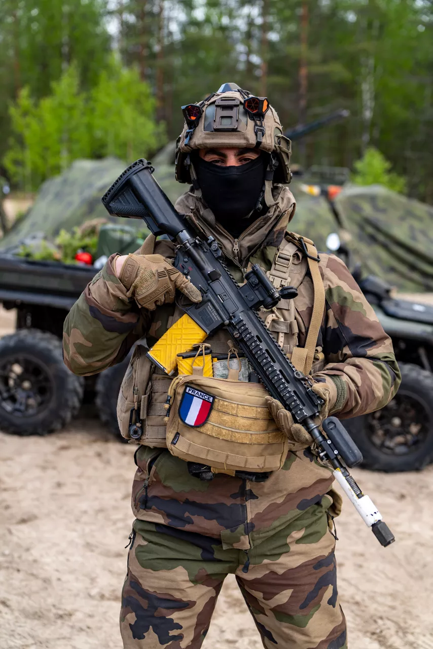 A French soldier poses with a rifle in front of a quad vehicle.

Exercise Northern Star 26 brings together more than 5,000 troops from seven NATO Allies – Finland, France, Hungary, Italy, Poland, the United Kingdom and the United States for joint training in the forests of Kainuu, Finland. Soldiers train side by side in dense terrain, combining air and ground operations as Chinook helicopters insert troops into landing zones, while armoured units manoeuvre and infantry advance through the forest to engage in simulated combat. For many Finnish conscripts, this marks the final and most demanding phase of their military service, testing skills developed throughout their training. Working together in these conditions helps Allied forces strengthen coordination and improve how they operate together in harsh terrain. The exercise runs from 18 to 30 May 2026.