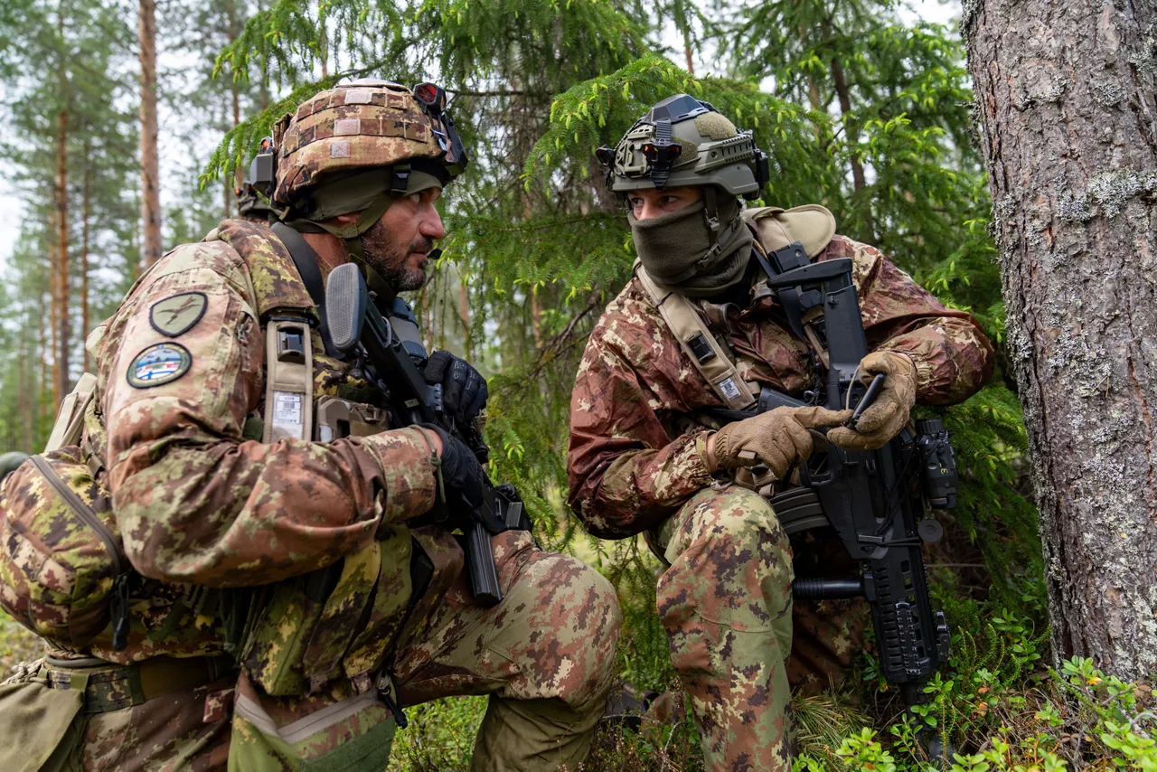 Italian soldiers hold their positions and discuss tactics during a simulated battle.

Exercise Northern Star 26 brings together more than 5,000 troops from seven NATO Allies – Finland, France, Hungary, Italy, Poland, the United Kingdom and the United States for joint training in the forests of Kainuu, Finland. Soldiers train side by side in dense terrain, combining air and ground operations as Chinook helicopters insert troops into landing zones, while armoured units manoeuvre and infantry advance through the forest to engage in simulated combat. For many Finnish conscripts, this marks the final and most demanding phase of their military service, testing skills developed throughout their training. Working together in these conditions helps Allied forces strengthen coordination and improve how they operate together in harsh terrain. The exercise runs from 18 to 30 May 2026.