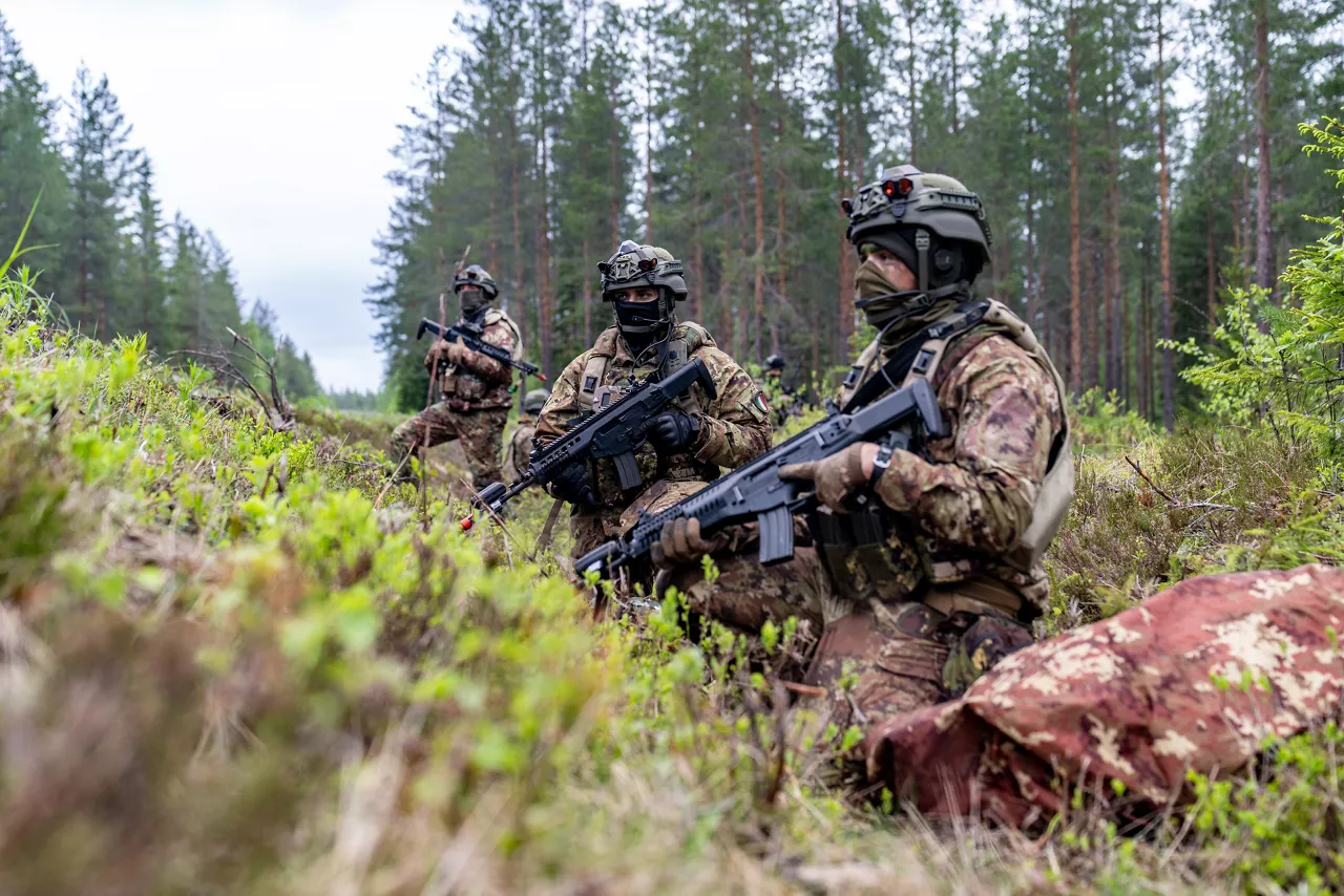 Italian soldiers secure the area during a simulated battle.

Exercise Northern Star 26 brings together more than 5,000 troops from seven NATO Allies – Finland, France, Hungary, Italy, Poland, the United Kingdom and the United States for joint training in the forests of Kainuu, Finland. Soldiers train side by side in dense terrain, combining air and ground operations as Chinook helicopters insert troops into landing zones, while armoured units manoeuvre and infantry advance through the forest to engage in simulated combat. For many Finnish conscripts, this marks the final and most demanding phase of their military service, testing skills developed throughout their training. Working together in these conditions helps Allied forces strengthen coordination and improve how they operate together in harsh terrain. The exercise runs from 18 to 30 May 2026.