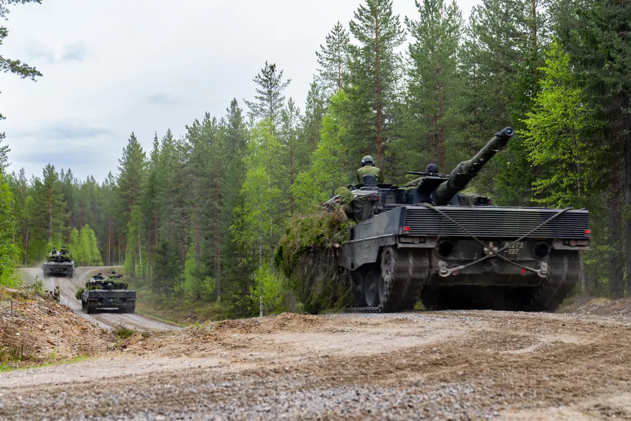 Finnish Leopard 2 tanks move through the forest as they advance.

Exercise Northern Star 26 brings together more than 5,000 troops from seven NATO Allies – Finland, France, Hungary, Italy, Poland, the United Kingdom and the United States for joint training in the forests of Kainuu, Finland. Soldiers train side by side in dense terrain, combining air and ground operations as Chinook helicopters insert troops into landing zones, while armoured units manoeuvre and infantry advance through the forest to engage in simulated combat. For many Finnish conscripts, this marks the final and most demanding phase of their military service, testing skills developed throughout their training. Working together in these conditions helps Allied forces strengthen coordination and improve how they operate together in harsh terrain. The exercise runs from 18 to 30 May 2026.