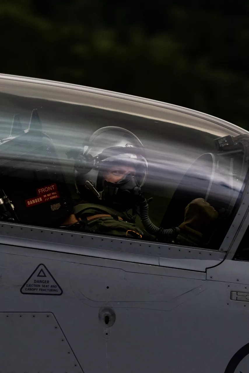 A Swedish Air Force pilot pumps his fist as he taxis his JAS 39 Gripen fighter for takeoff at Bardufoss Air Station in Norway during exercise Ramstein Flag 26. This year’s iteration of NATO's annual large-scale exercise involved 18 nations flying more than 200 aircraft from 20 different locations across Europe, including several air bases in the High North. The Swedish Air Force sent a detachment of Gripens to Air Station Bardufoss, where Norway has brought a Cold War-era bunker-hangar complex back into use after roughly four decades of dormancy.
