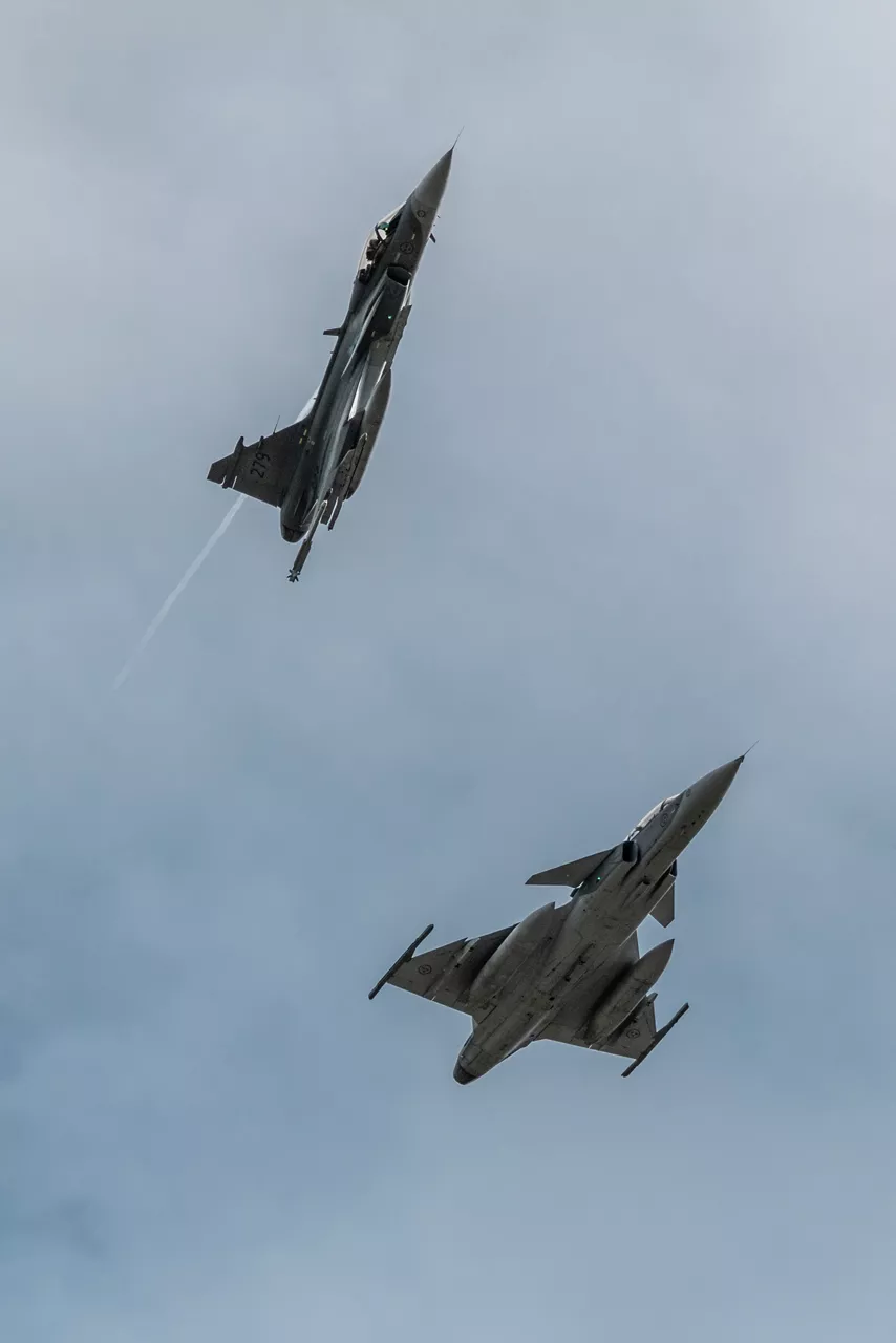 A Swedish Air Force JAS 39 Gripen breaks right to enter the landing pattern at Bardufoss Air Station in Norway during exercise Ramstein Flag 26. This year’s iteration of NATO's annual large-scale exercise involved 18 nations flying more than 200 aircraft from 20 different locations across Europe, including several air bases in the High North. The Swedish Air Force sent a detachment of Gripens to Air Station Bardufoss, where Norway has brought a Cold War-era bunker-hangar complex back into use after roughly four decades of dormancy.