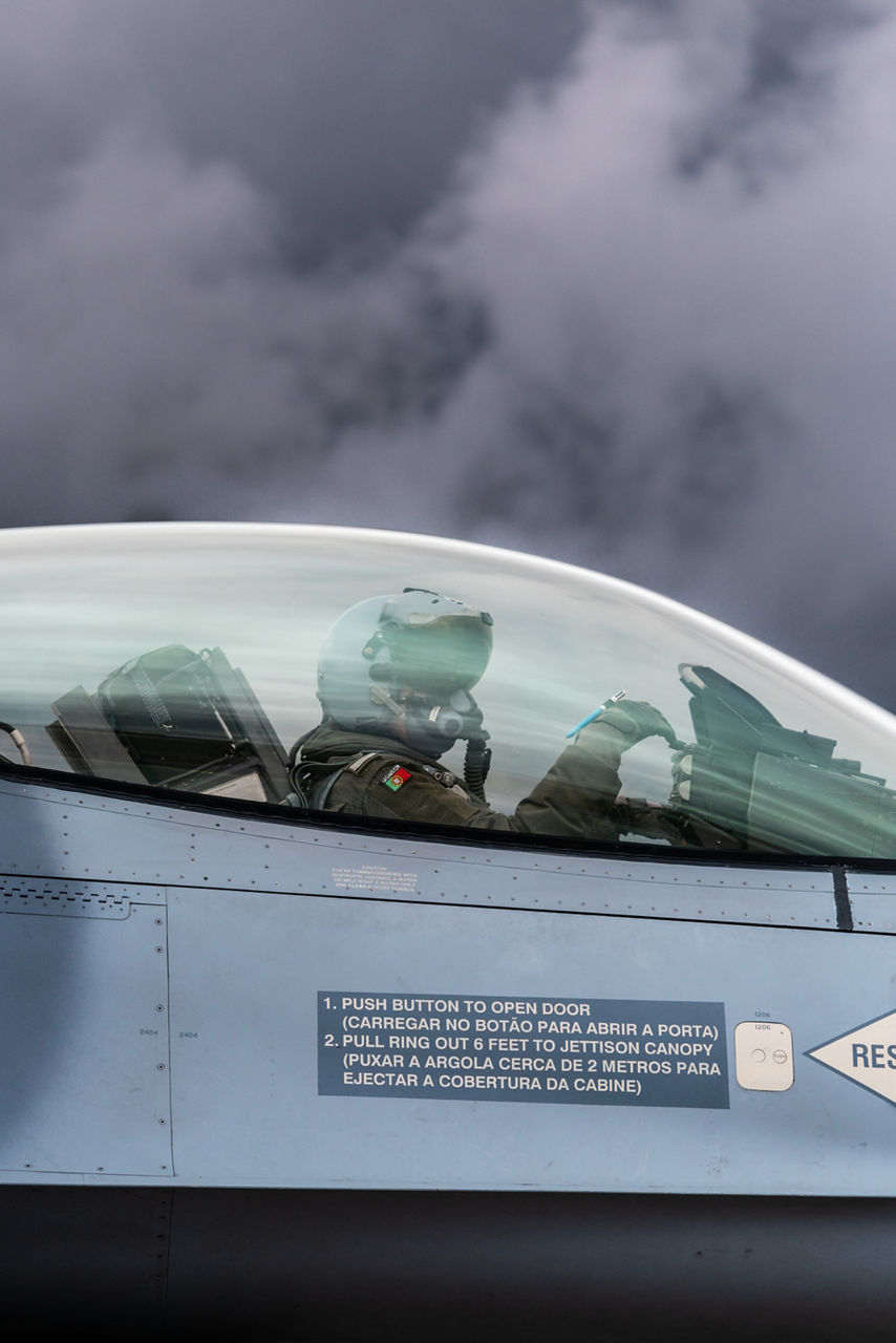 A Portuguese Air Force fighter pilot taxis for take-off in his F-16 Fighting Falcon during a Baltic Air Policing Rotation in Estonia. 

Baltic Air Policing is a peacetime mission in which NATO Allies deploy fighter jets to cover the airspace of Estonia, Latvia and Lithuania.
