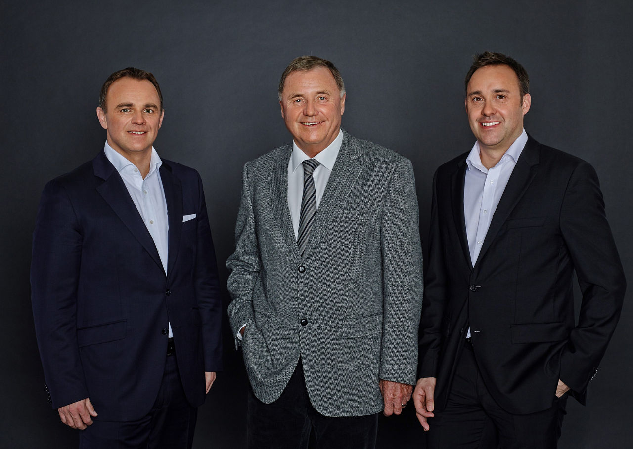 PALFINGER family 2013: Hubert Palfinger Snr. surrounded by his sons Ing. Hubert Palfinger and Ing. Mag. Hannes Palfinger