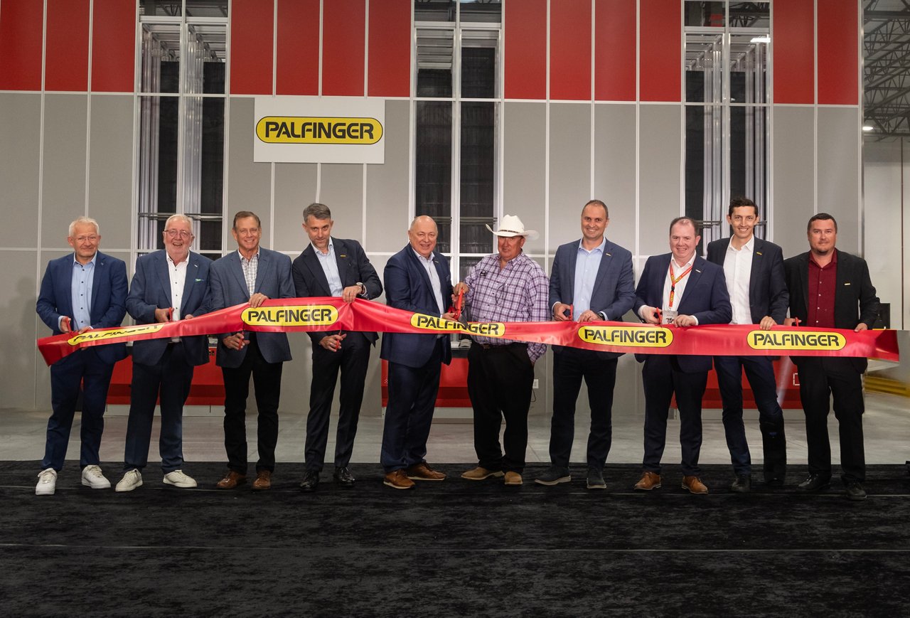 A ceremonial ribbon cutting marked the opening of PALFINGER’s new Parts Distribution Center, featuring (left-right): Thimo Schulz, L.I.T. CEO; Fokke Fels, L.I.T. Chairman of the Board; Dave Larson, PALFINGER consultant; Gerhard Sturm; PALFINGER SVP, Global Sales & Service; Andreas Klauser, PALFINGER CEO; Village of Huntley Mayor Timothy Hoeft; Ismael Daneluz, PALFINGER VP of Sales & Service, North & Latin America; Balthasar Gwechenberger, PALFINGER VP, Global After Sales; Florian Kaiser, Regional Director, After Sales; and David Kovamees, Regional Senior Manager, Spare Parts.