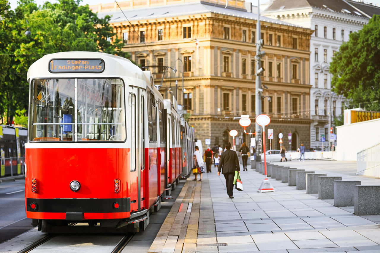 Old fashioned tram goes by the street of Vienna. Vienna is a capital and largest city of Austria