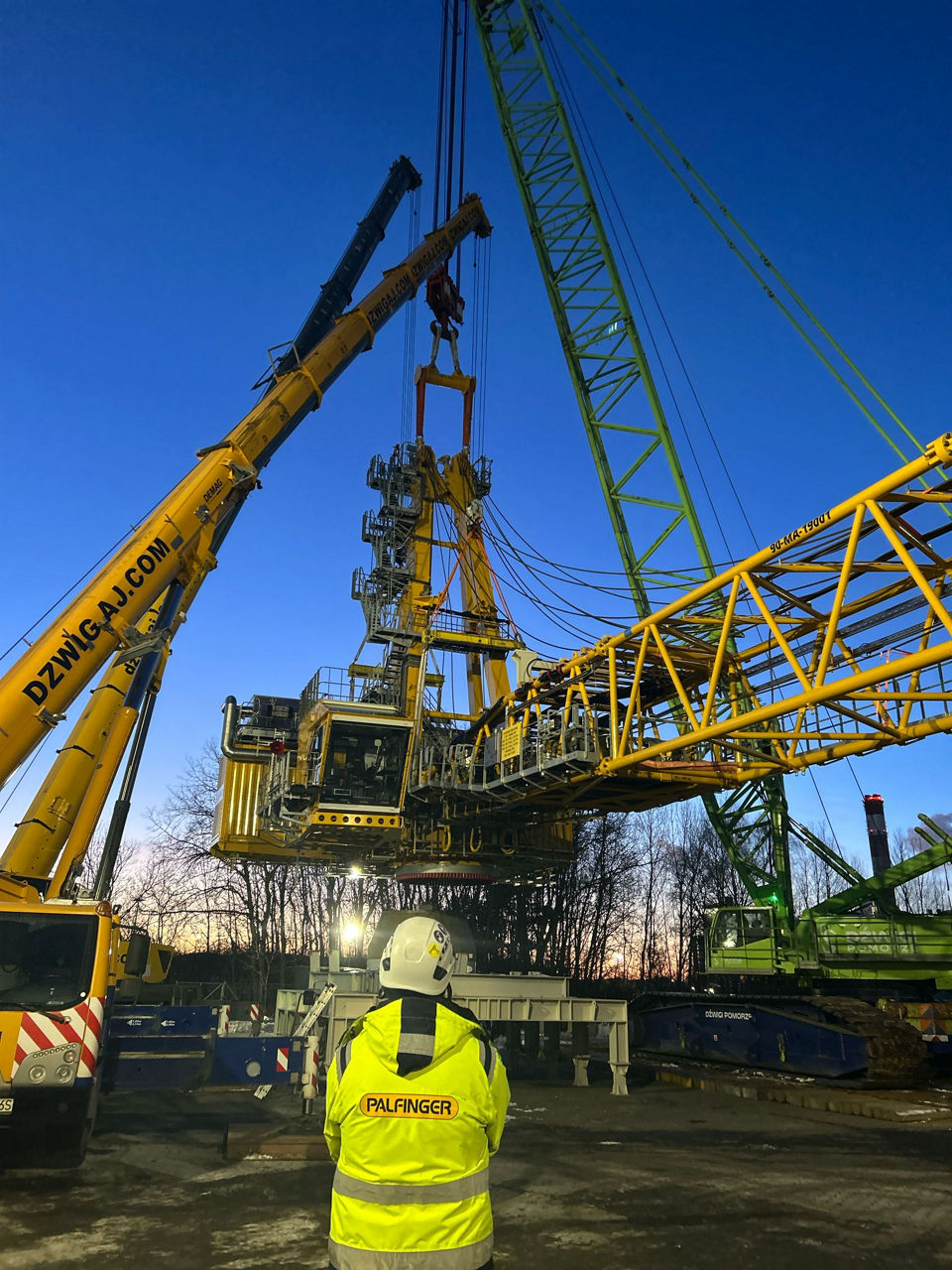 Technicians are testing a PALFINGER marine offshore crane in Gdynia, Poland
