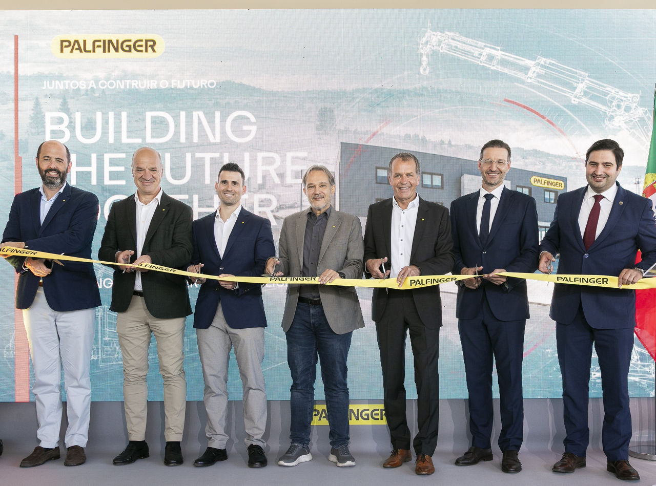 PALFINGER executives and guests cut the ribbon at the official opening ceremony of the new PALFINGER Sales & Service Hub in Lisbon.