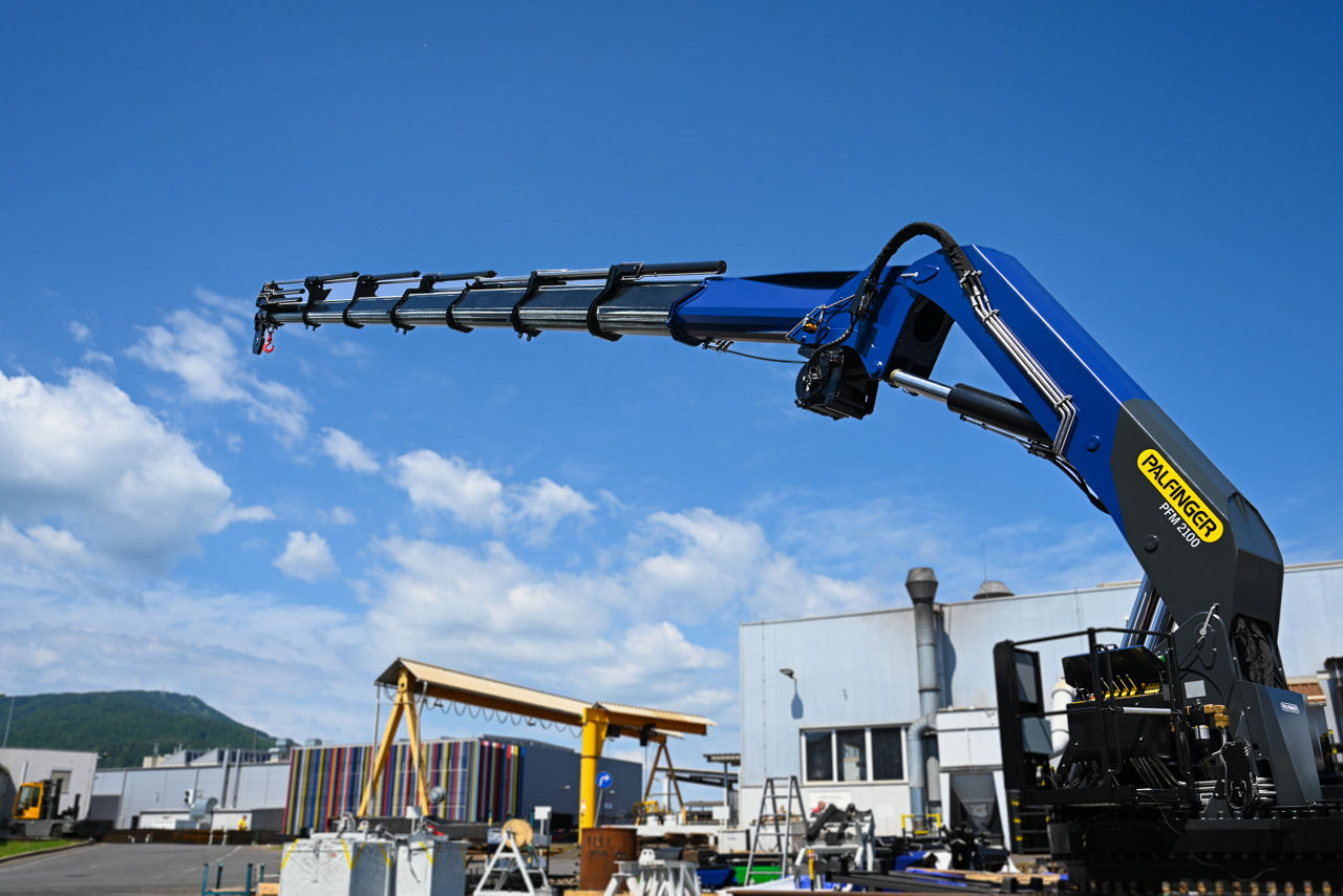 A PALFINGER marine crane in front of the production site in Maribor
