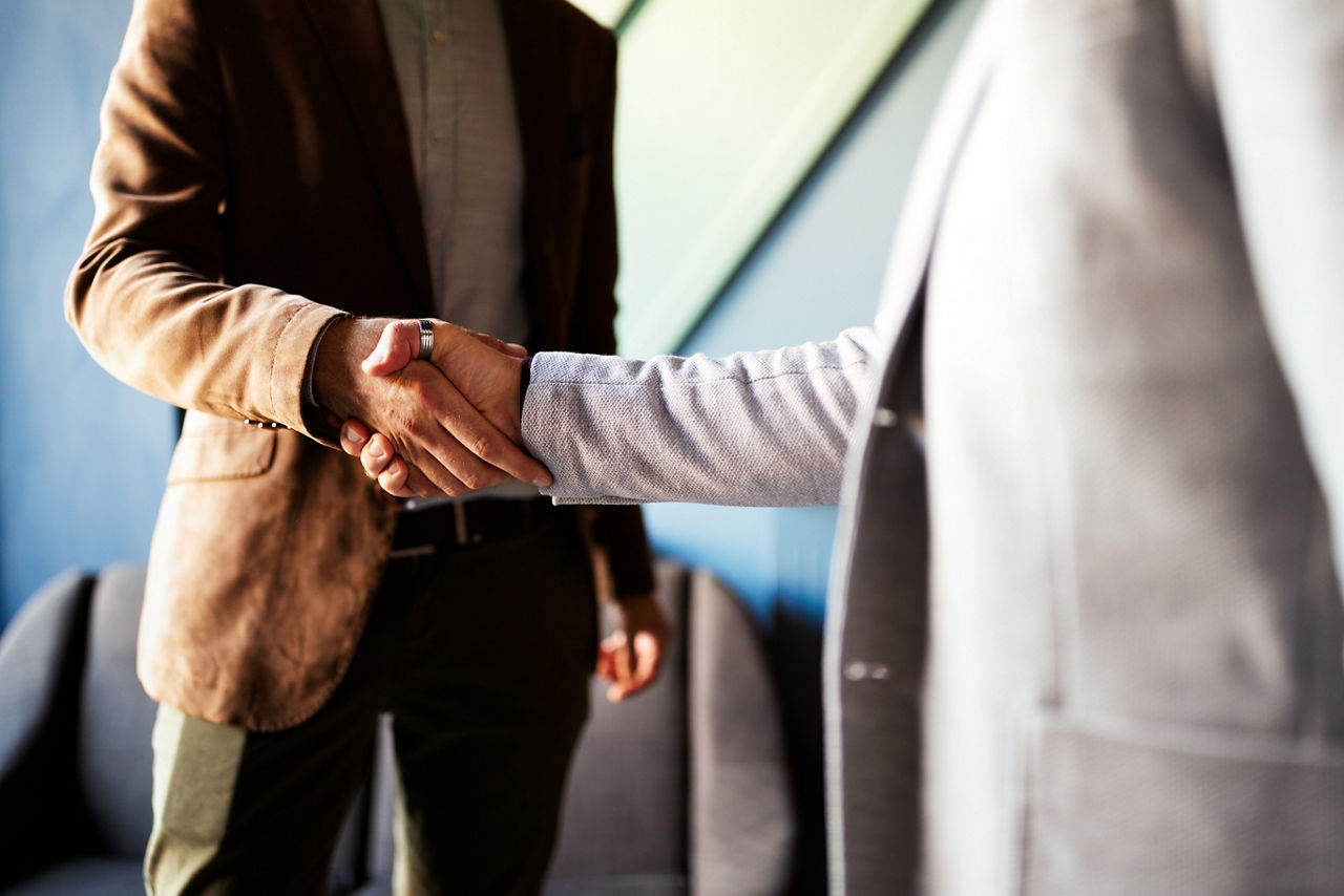 Business handshake and successful business people concept. Partnership, deal, agreement., Business handshake and successful business people concept. Partnership, deal, agreement.