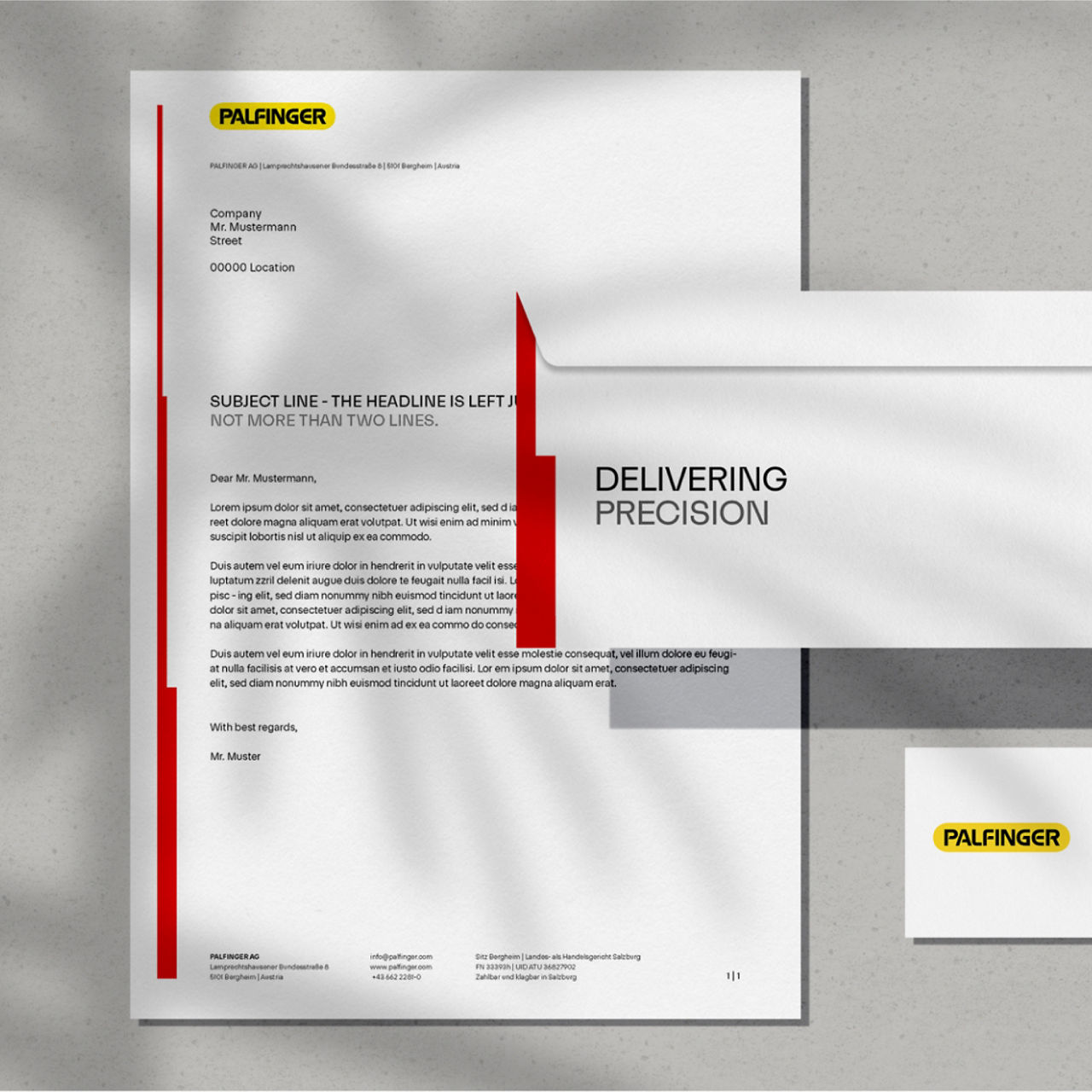 PALFINGER Geschäftspapier-Set einschließlich eines Briefkopfs und Umschlags mit roten, vertikalen Markenakzenten.