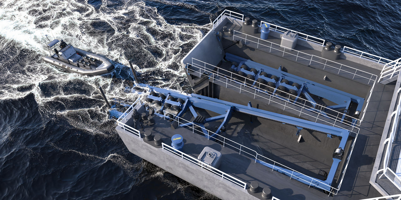 Hydraulically powered quad wheel-drive units rotate in the recovery direction, using friction to securely recover the boat into the cradle.