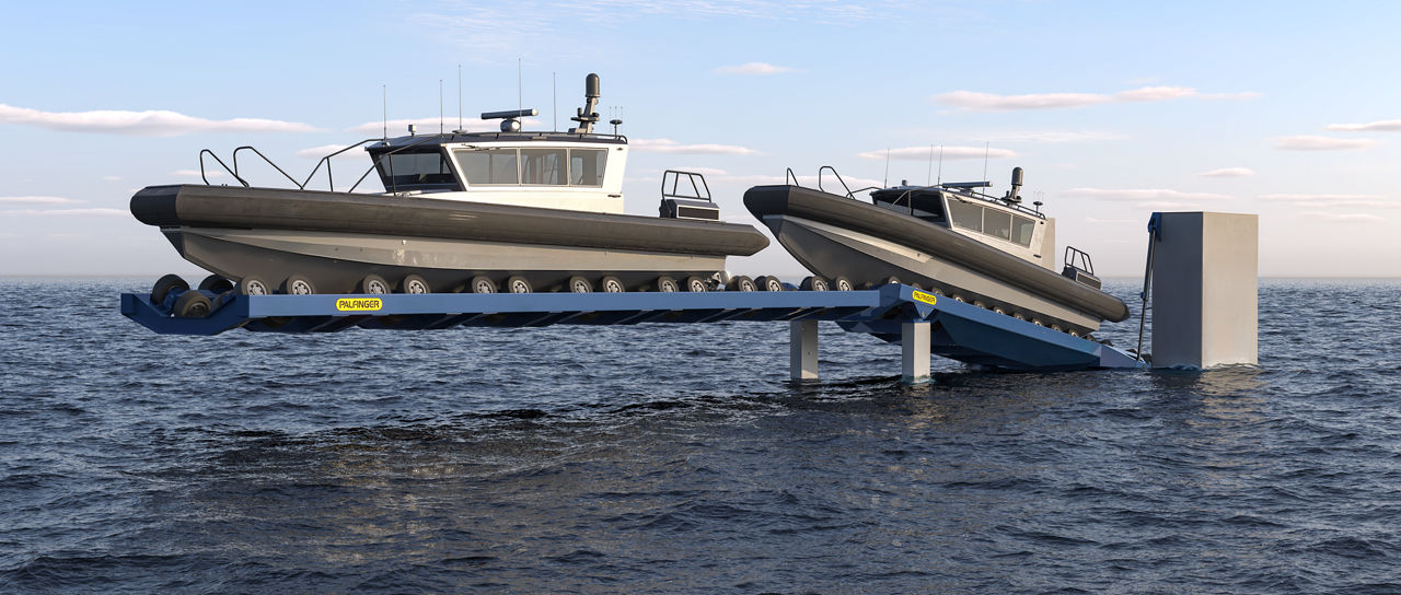 Boat #1 in the parking position on the parking cradle, and Boat #2 in the launch/recovery position on the slipway cradle.