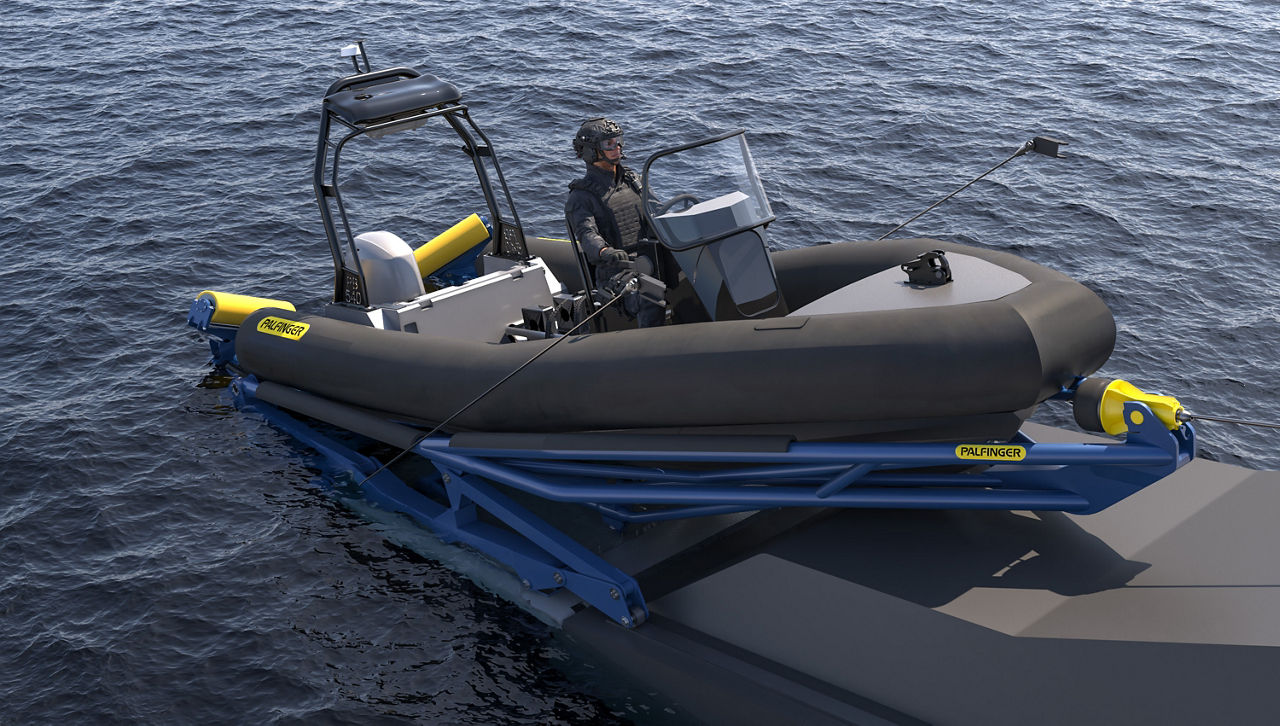 The boat is driven into the cradle and guided to its final position by the roller arrangements on the cradle.
