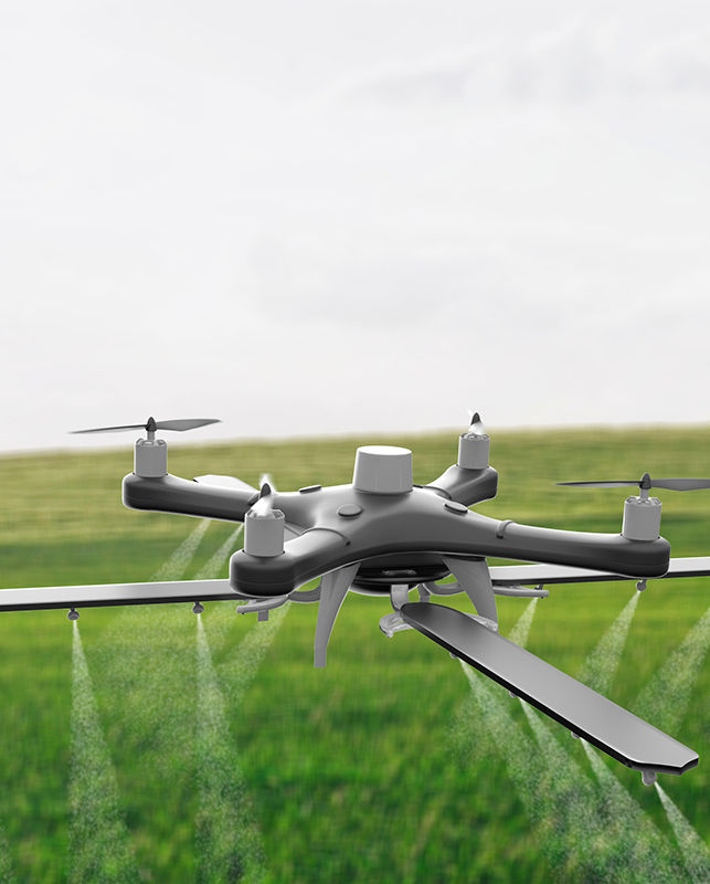 Drones spraying a field