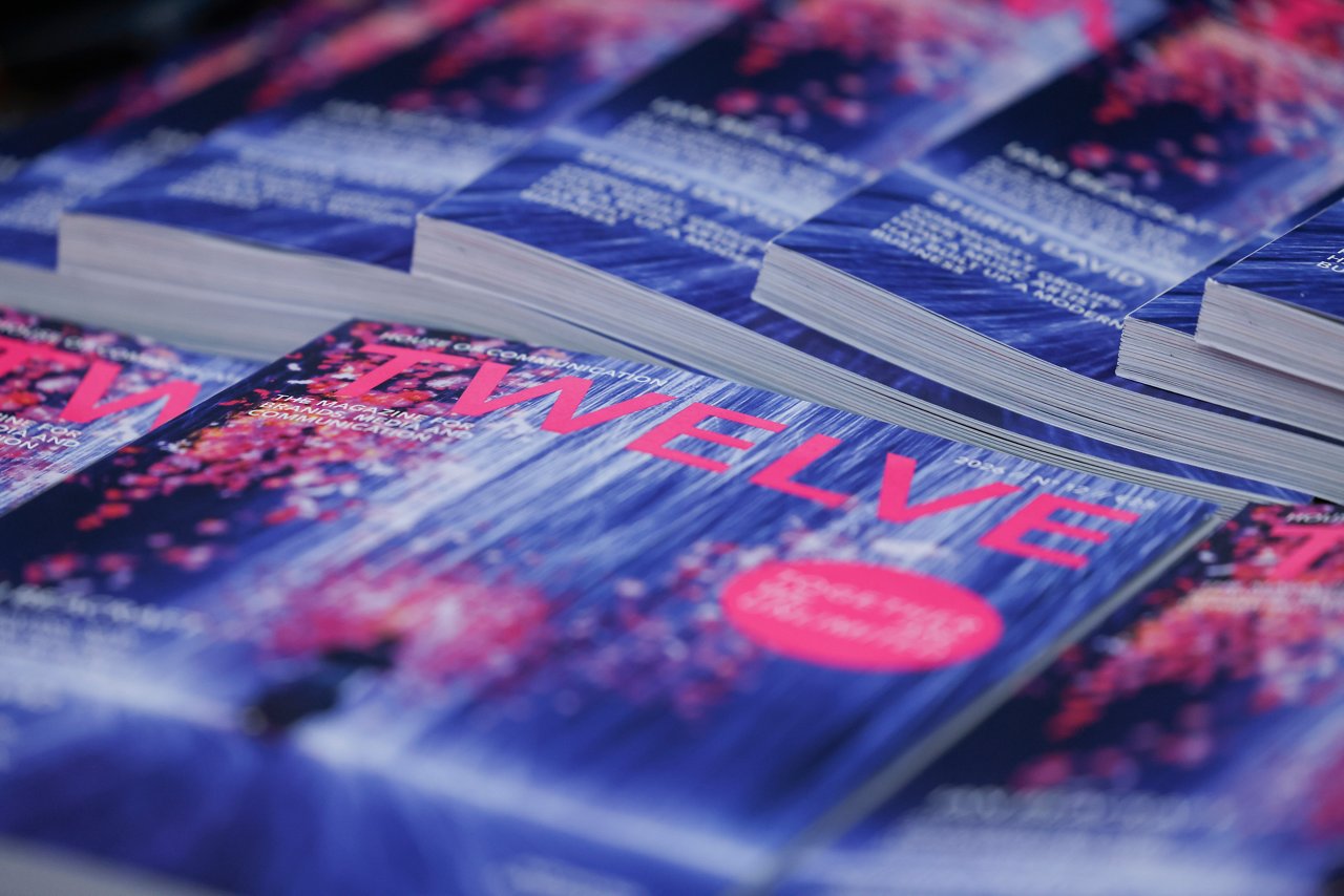 several copies of twelve on a table