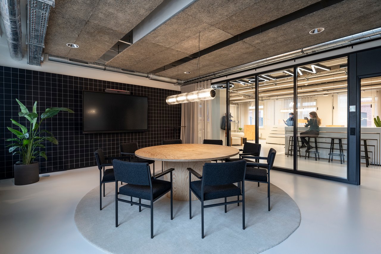 chairs around a round table in a conference room