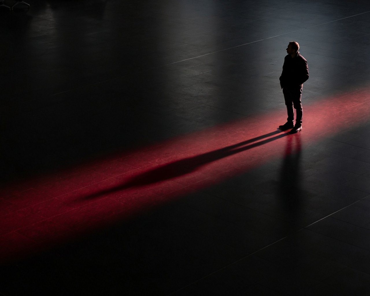 futuristic visualization of a black box with a key hole where red glowing lights come out