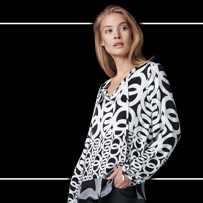 female model poses for eterna fashion