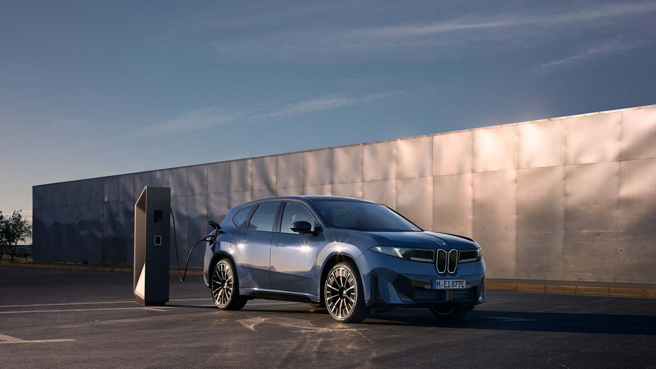 BMW iX3 standing at a charging stand