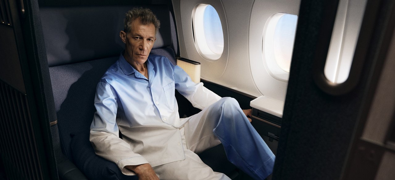 Men flying first class in Lufthansa x Sho Shibuya Suite