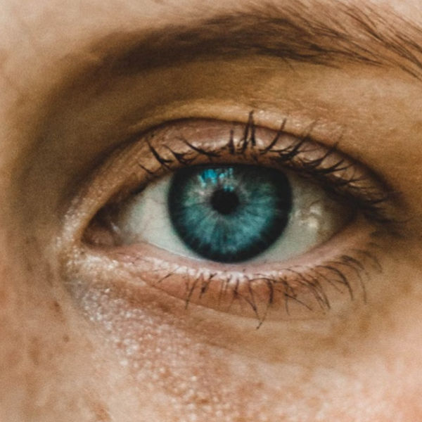 Close up shot of women with blue eyes
