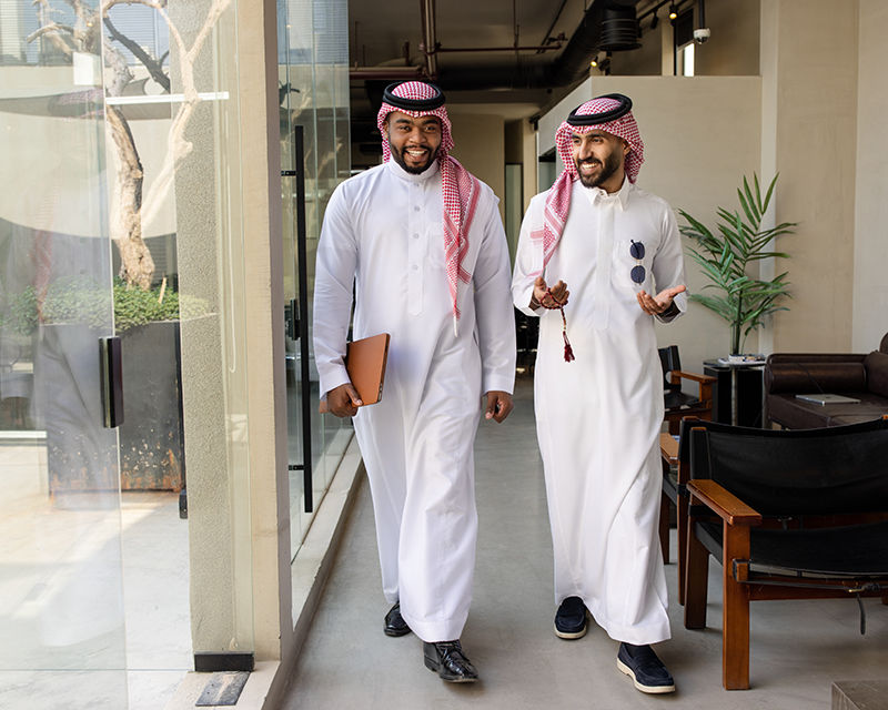 Business professionals representing the future of business and workplace innovation in Qiddiya City