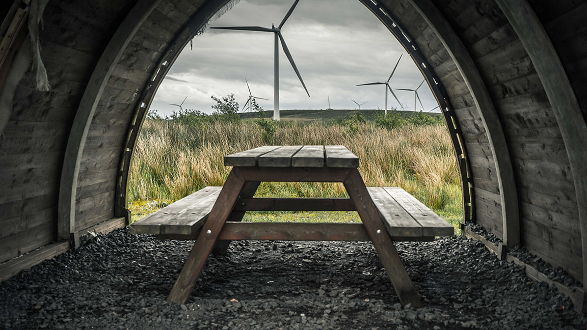 Whitelee Wind Farm on the Eaglesham moor in Scotland seen through a picnic pod