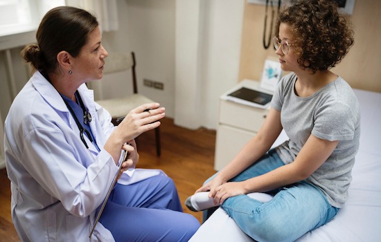 Doctor is checking a patient