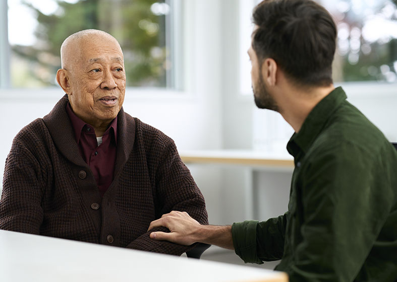Elderly gentleman in conversation