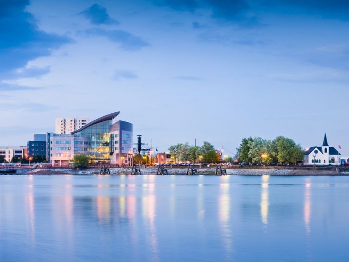 Pretty night time illuminations of the stunning Cardiff Bay, many sights visible including the Pierhead building (1897) and National Assembly for Wales.