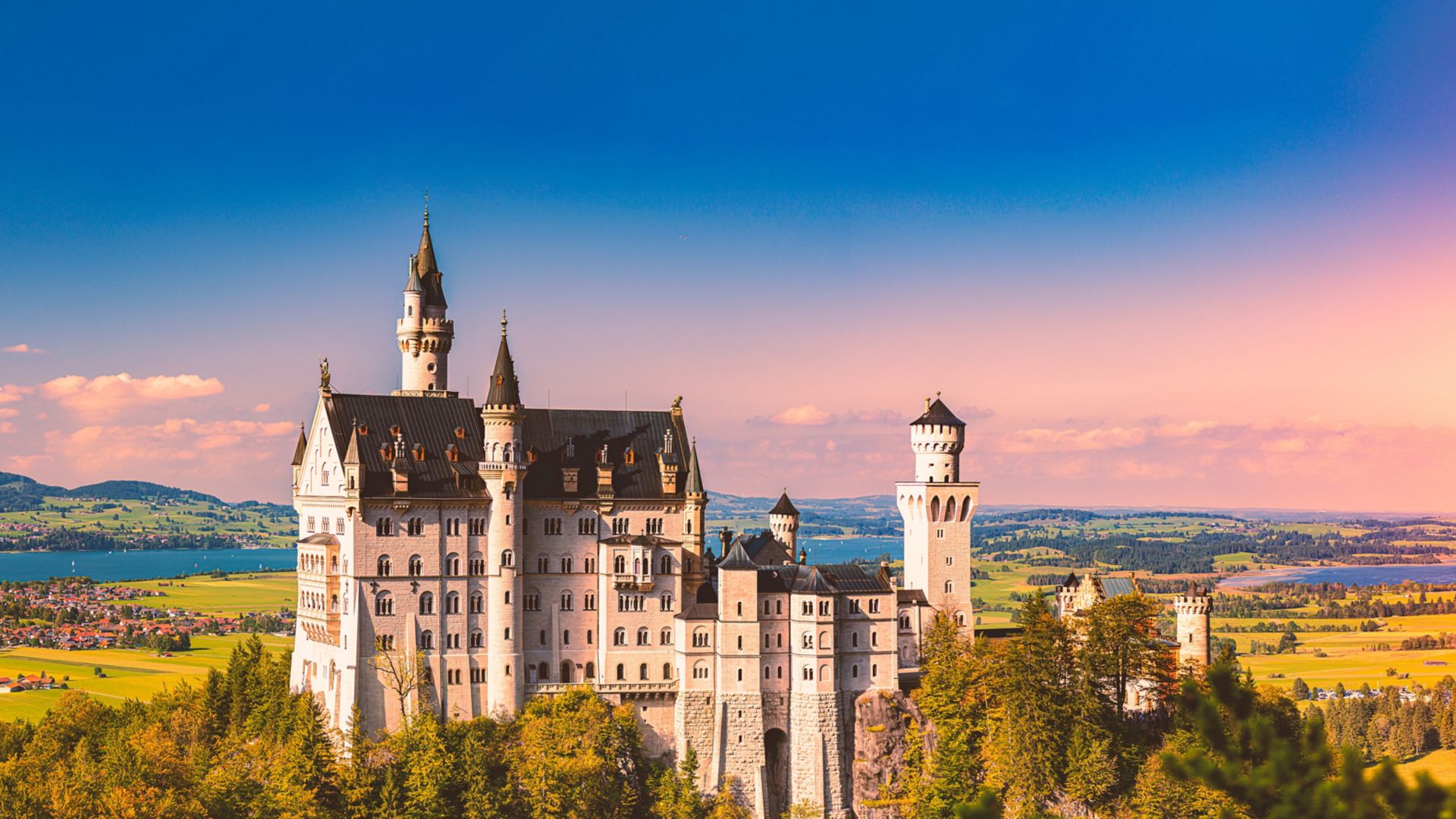 Beautiful view of world-famous Neuschwanstein Castle, the nineteenth-century Romanesque Revival palace built for King Ludwig II on a rugged cliff near Fussen, southwest Bavaria, Germany, Europe