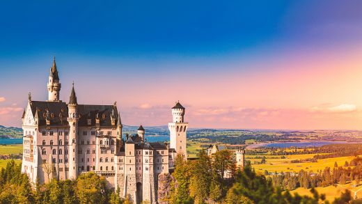 Beautiful view of world-famous Neuschwanstein Castle, the nineteenth-century Romanesque Revival palace built for King Ludwig II on a rugged cliff near Fussen, southwest Bavaria, Germany, Europe
