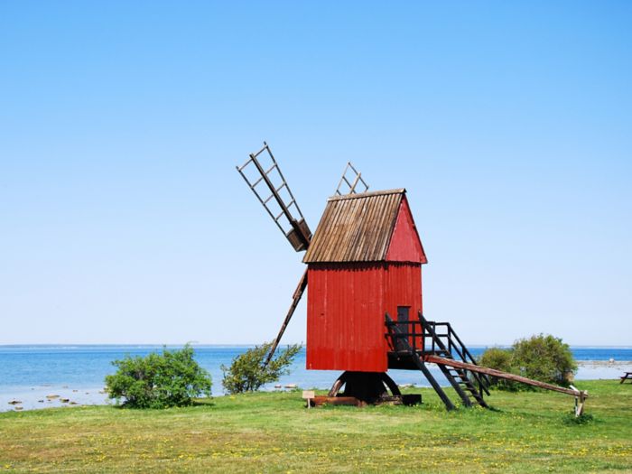 Old wooden traditional windmill by the coast of the swedish island Oland