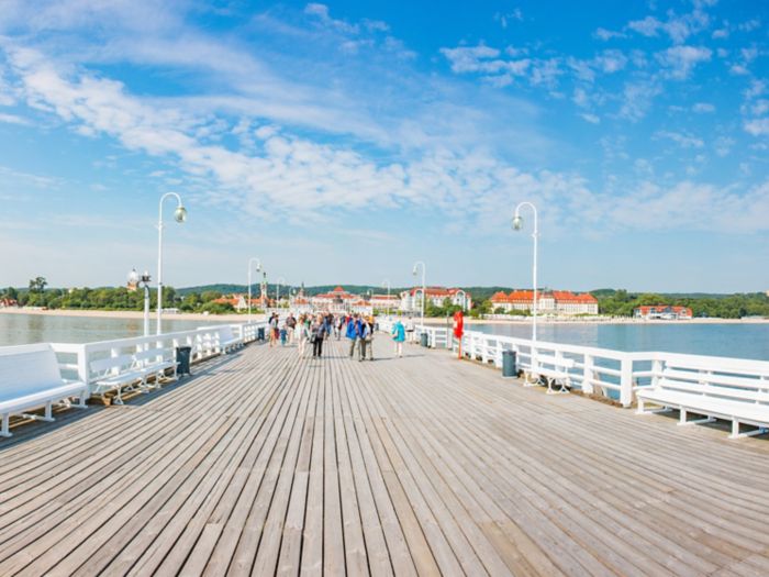 View of people walking on Sopot Pier in Gdynia, Poland on a sunny day