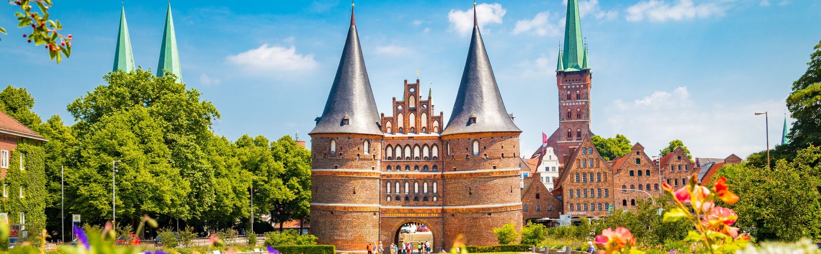 Historic town of Lübeck with famous Holstentor gate in summer, Schleswig-Holstein, northern Germany