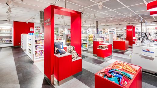 Onboard store with red shelves filled with items