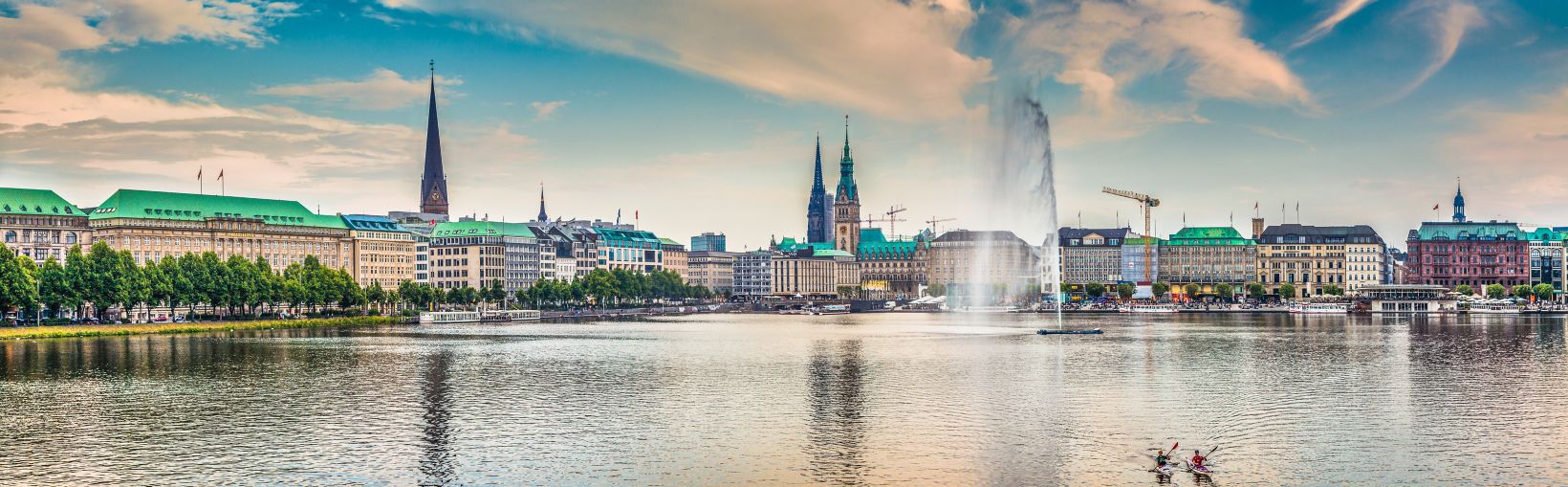 Binnenalster (Inner Alster Lake) panorama in Hamburg, Germany at sunset