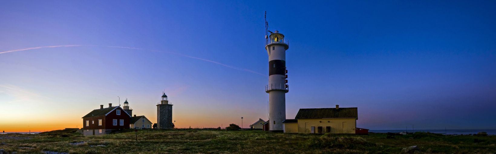 Lighthouse on the coast of Sweden at sundown