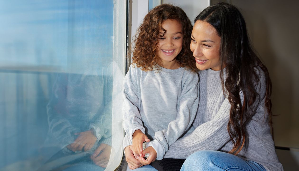 Mother and daughter onboard in the window