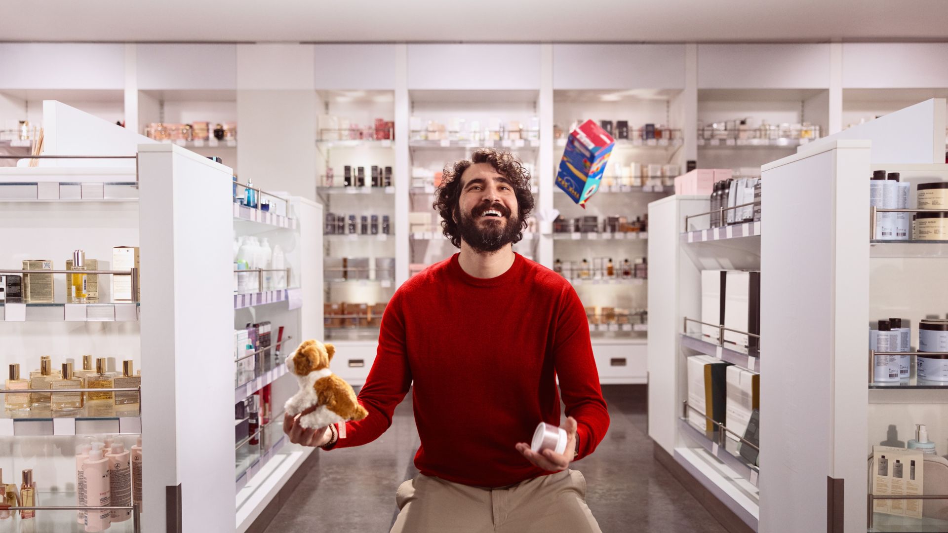 Man juggling at shopping onboard