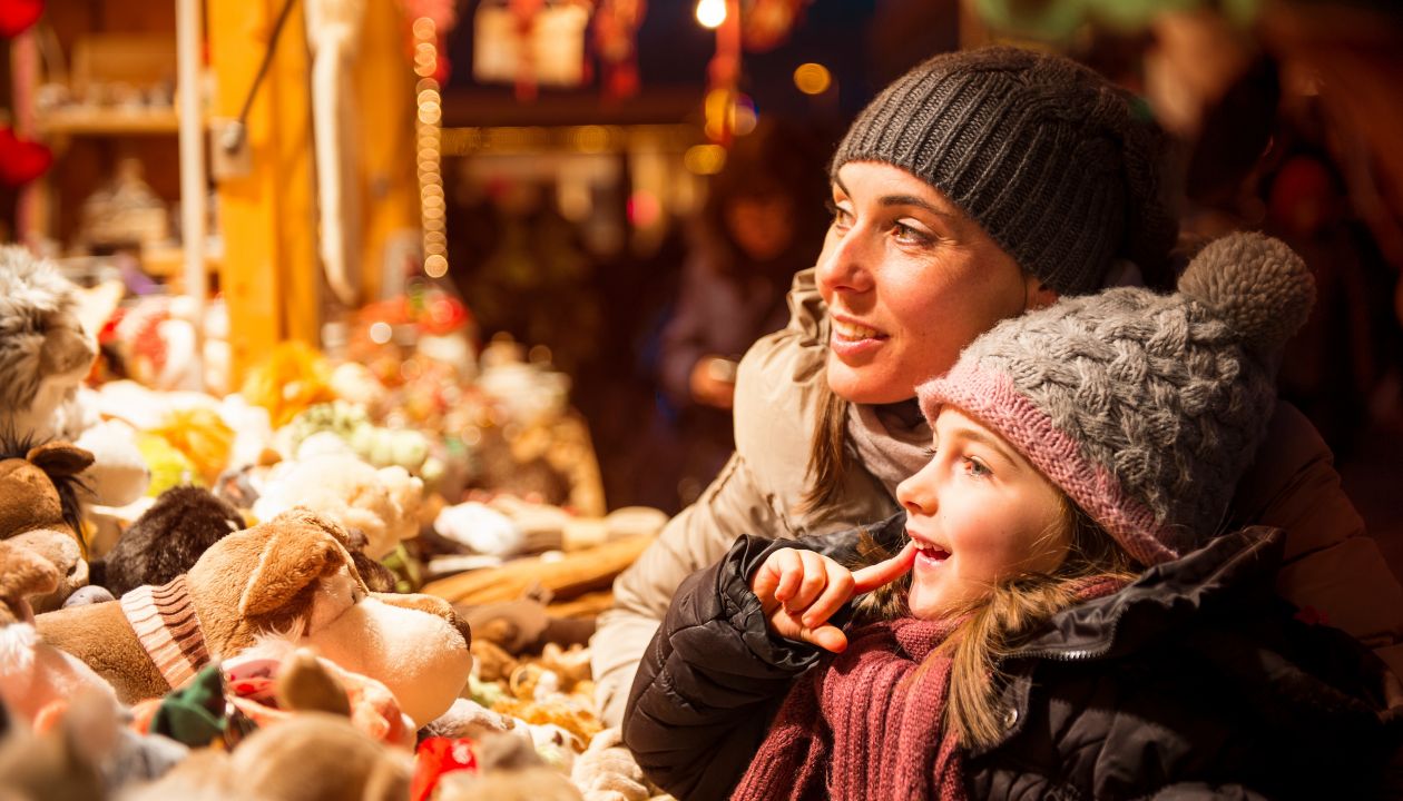 Girl on the christmas market at the gifts in december in South Tyrol