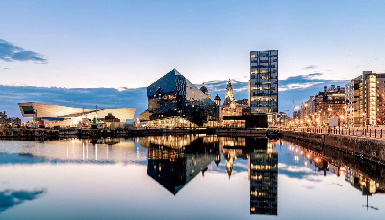 Liverpool Skyline building at Pier head and alber dock at sunset dusk, Liverpool England UK.